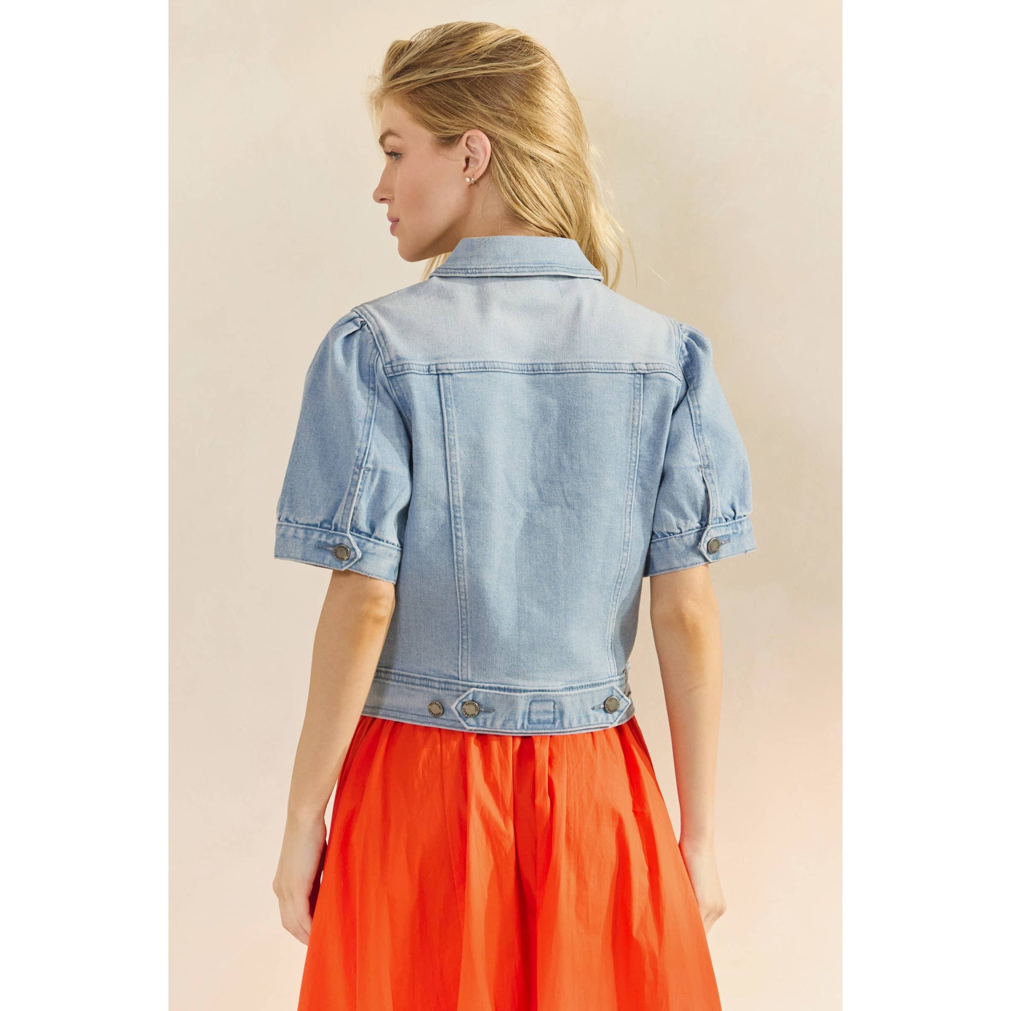 Back view of short sleeve denim jacket