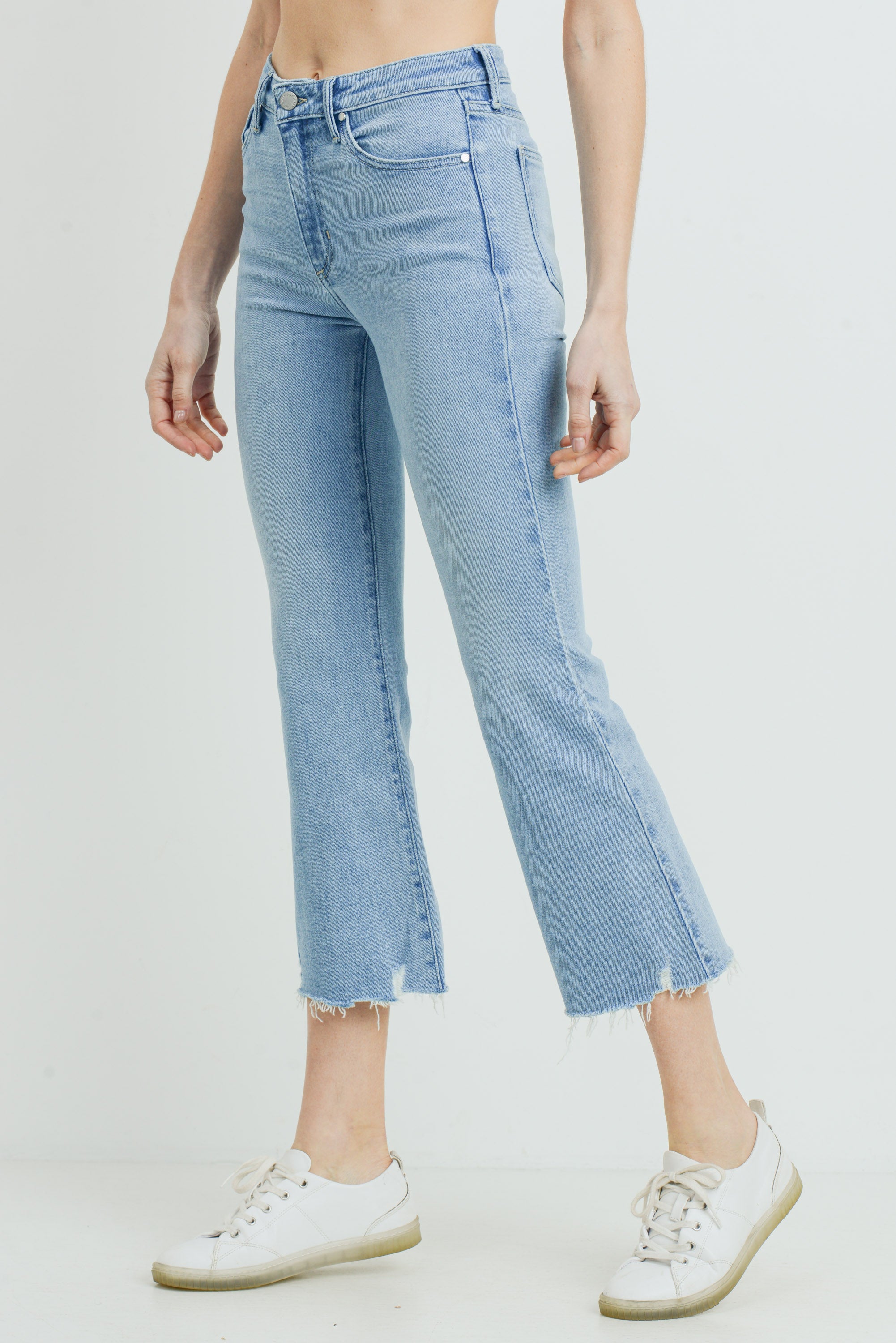 High Rise Crop Flare Distressed Hem in Light Denim