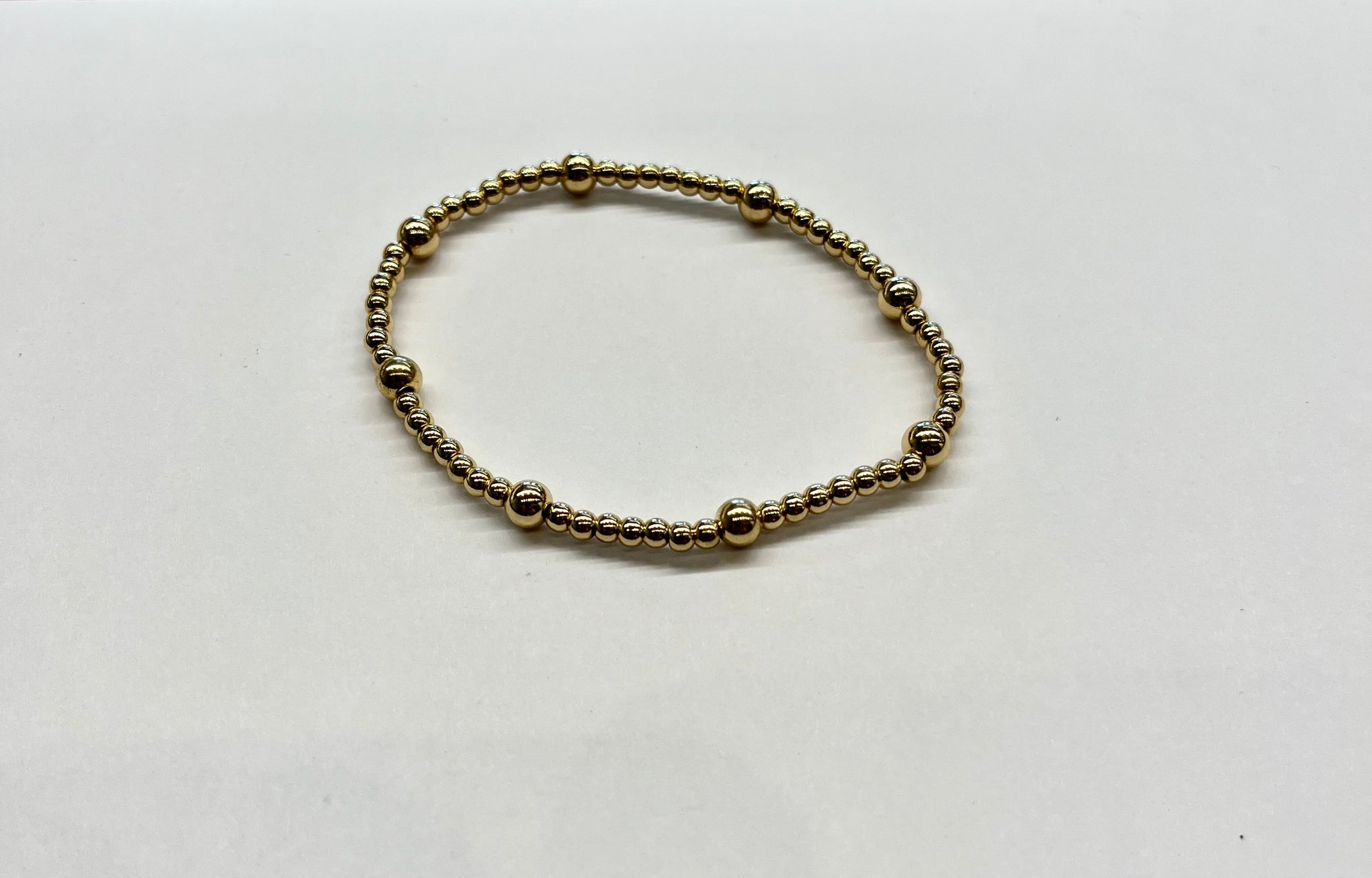 The Lucky Collective Gold Bead Stretch Bracelet